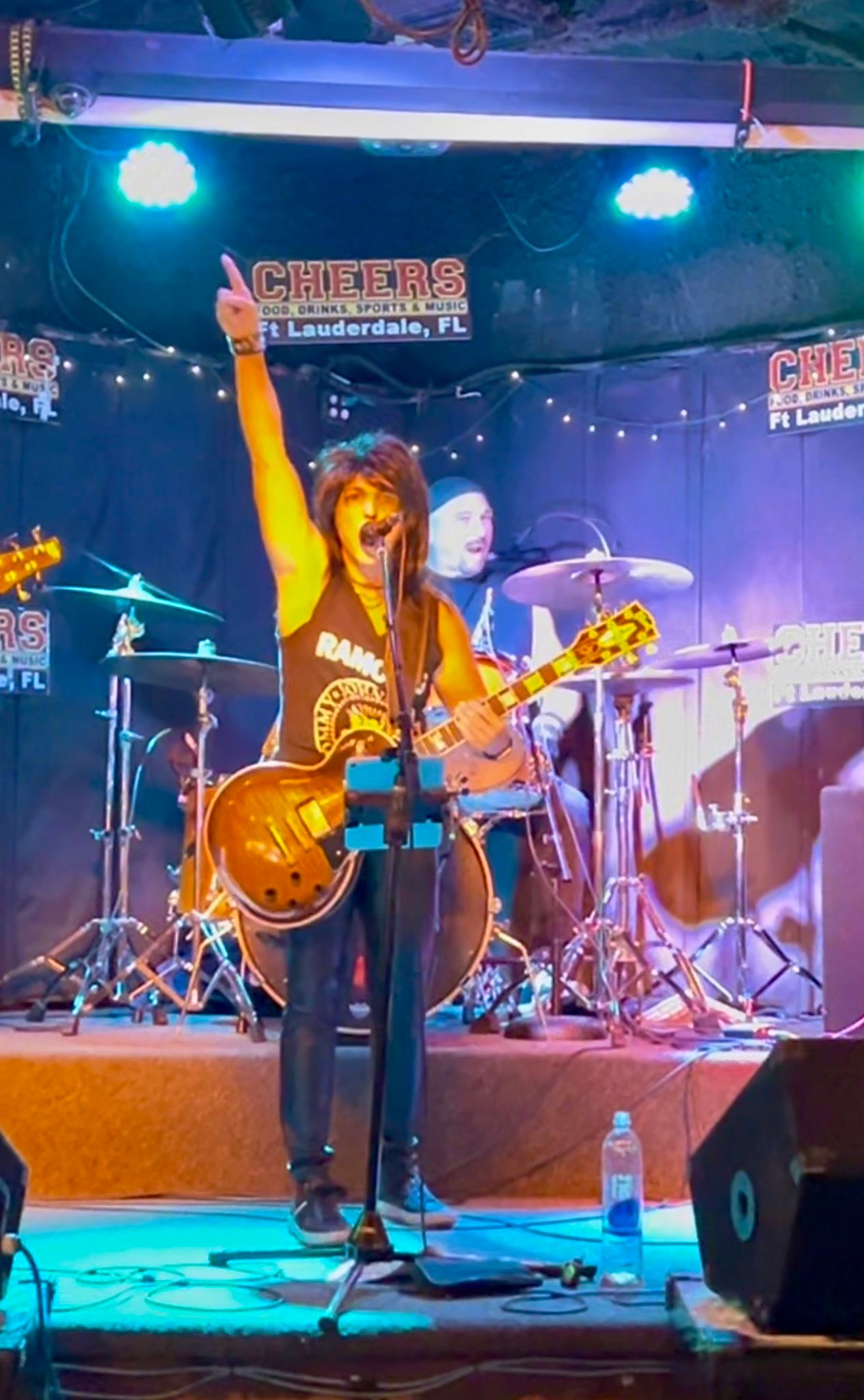 Arm raised mid-song